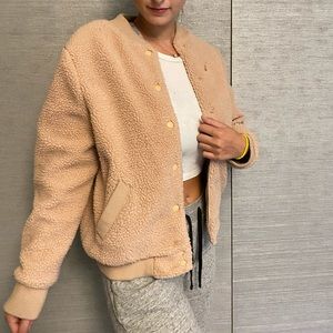 Light pink fuzzy shearling bomber